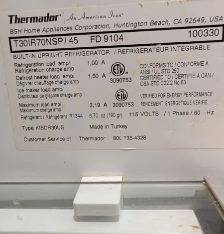 Thermador built-in refrigerator model and rating label photographed for service.